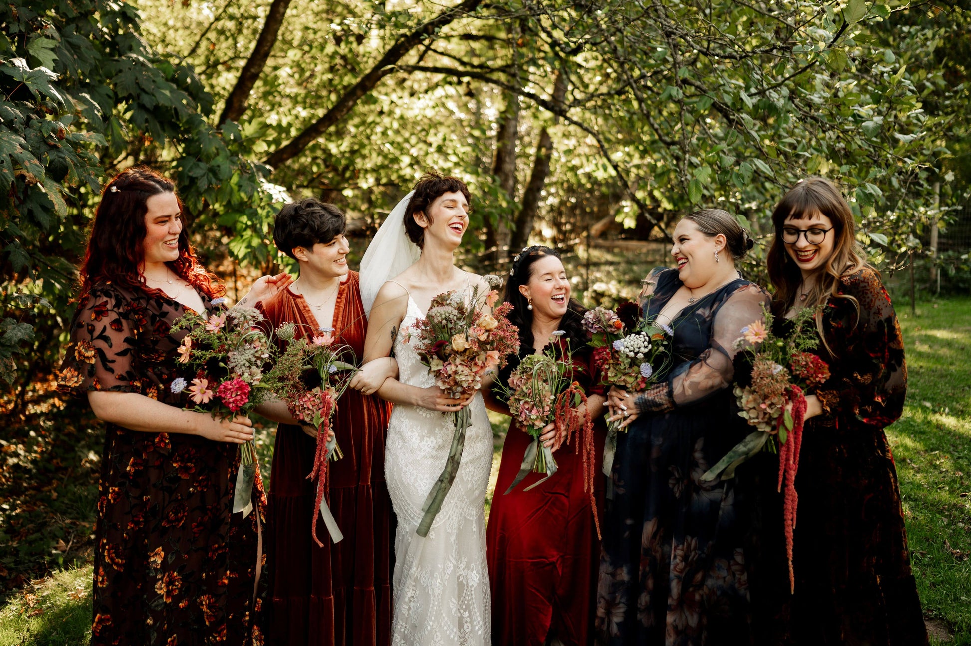 Bridesmaids with deep-toned fall bouquets featuring dahlias, amaranthus, and hydrangeas — rustic wedding florals by Kvetka Flower