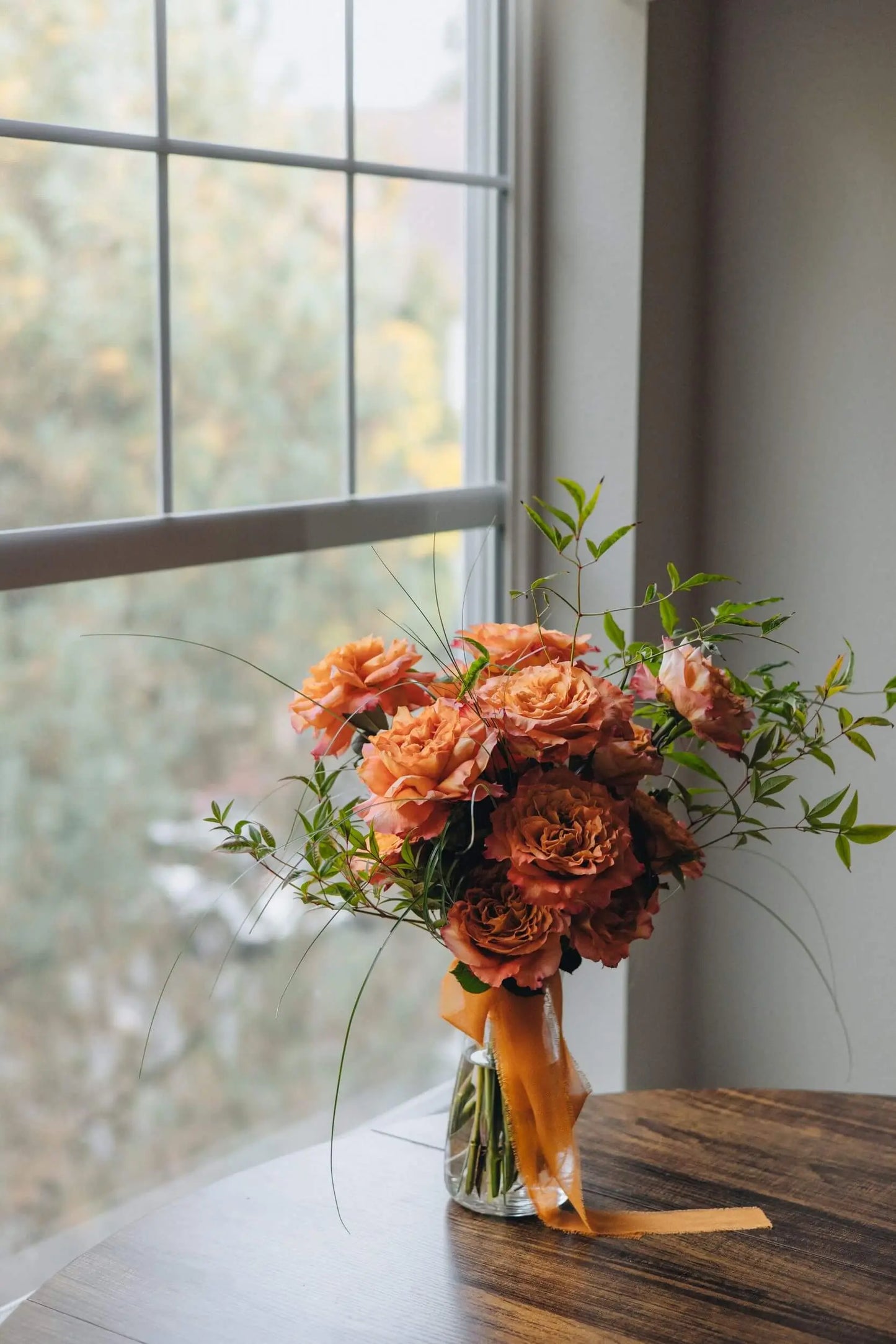 Fresh rose bouquet in natural window light Portland Oregon florist Kvetka Flower