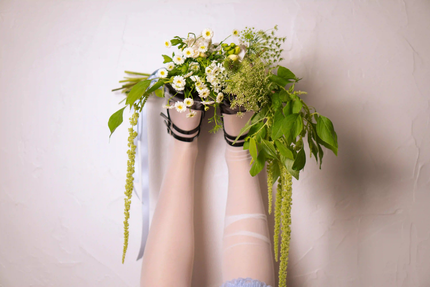 Creative floral event concept with upside-down bouquet and chamomile flowers — styled by Kvetka Flower, Portland OR.