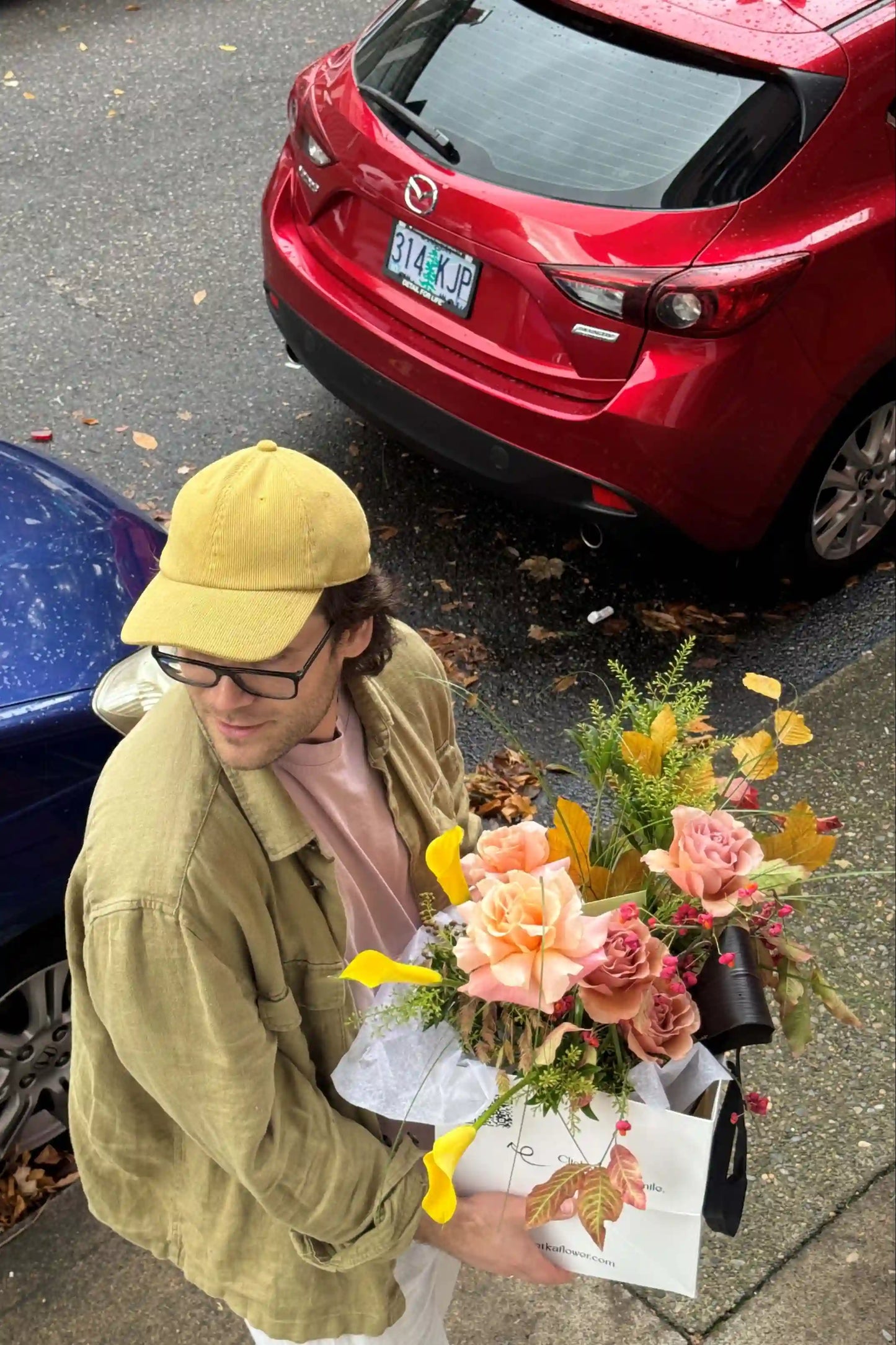 Fresh medium seasonal bouquet with roses and calla lilies by Portland florist Kvetka Flower same-day delivery available