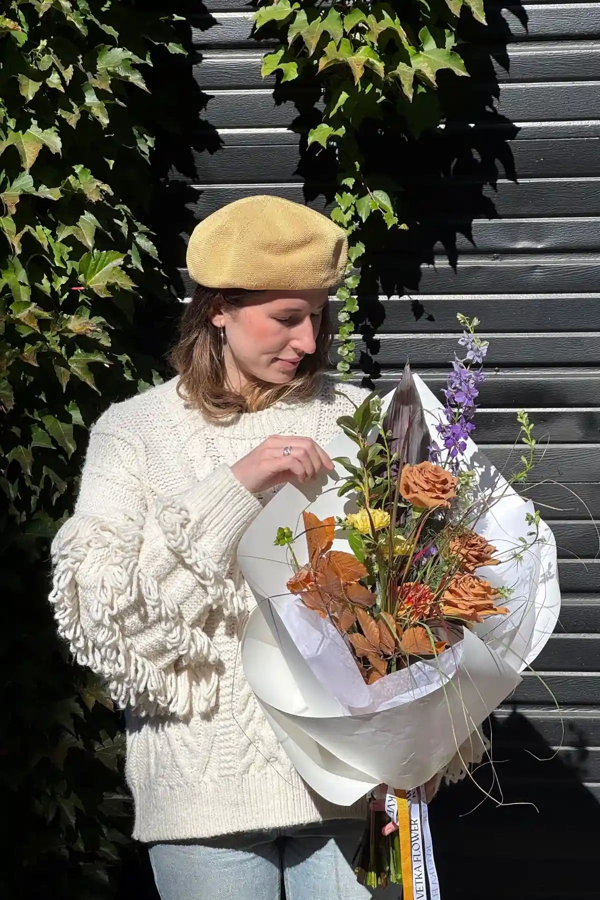 Handcrafted fresh seasonal bouquet small with warm autumn tones, orange roses and purple accents by Kvetka Flower