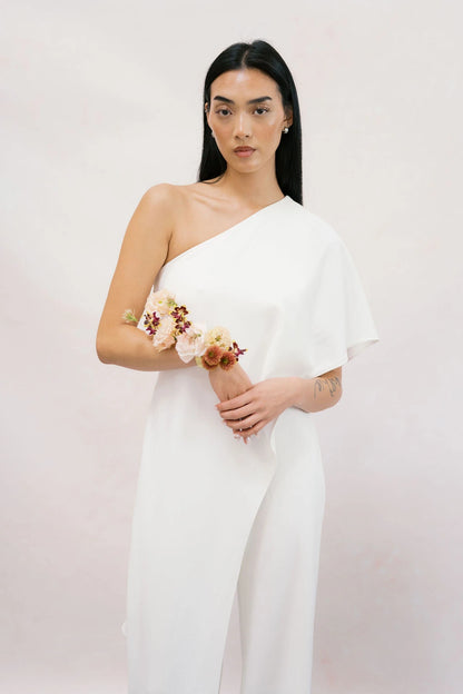 Bride portrait with artistic wire-frame wrist corsage in blush and terracotta tones Portland wedding florist