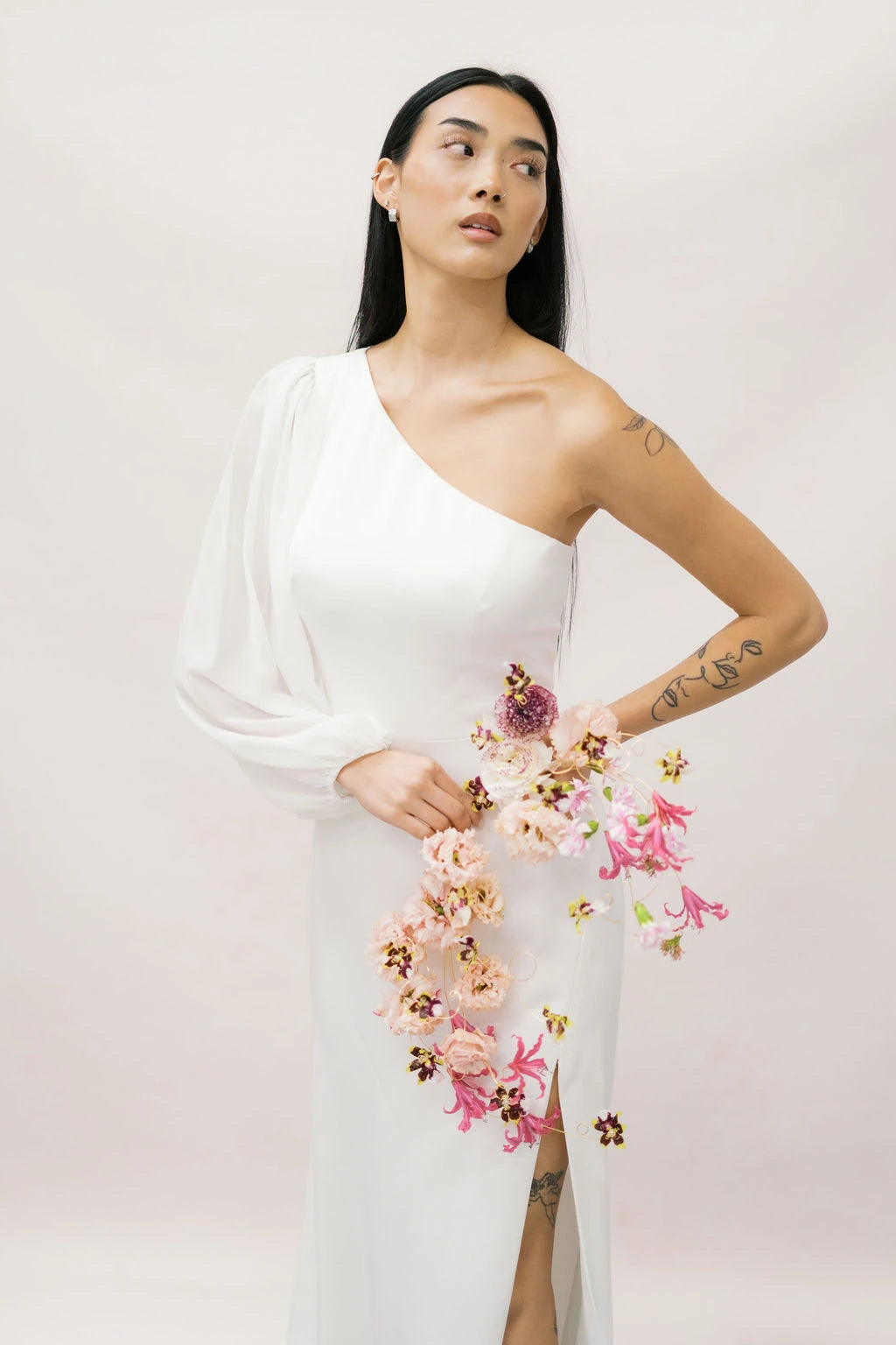 Avant-garde bridal bouquet on gold wire frame with pink nerine and blush lisianthus by Portland wedding florist Kvetka Flower