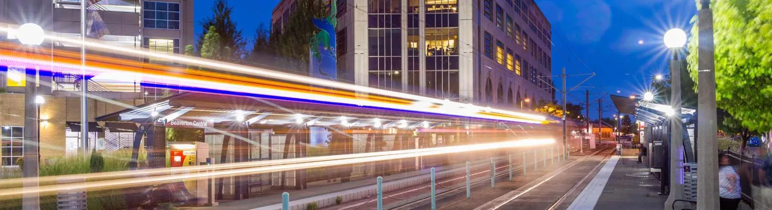 Downtown Beaverton Central MAX station at night with light trails - same-day flower delivery to Beaverton Oregon