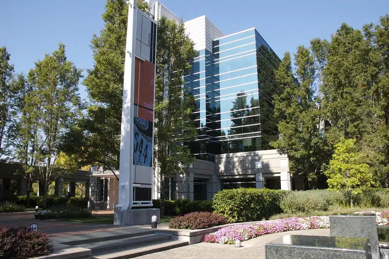 Modern office building in Beaverton Oregon business district with colorful flower beds - Kvetka Flower delivery area
