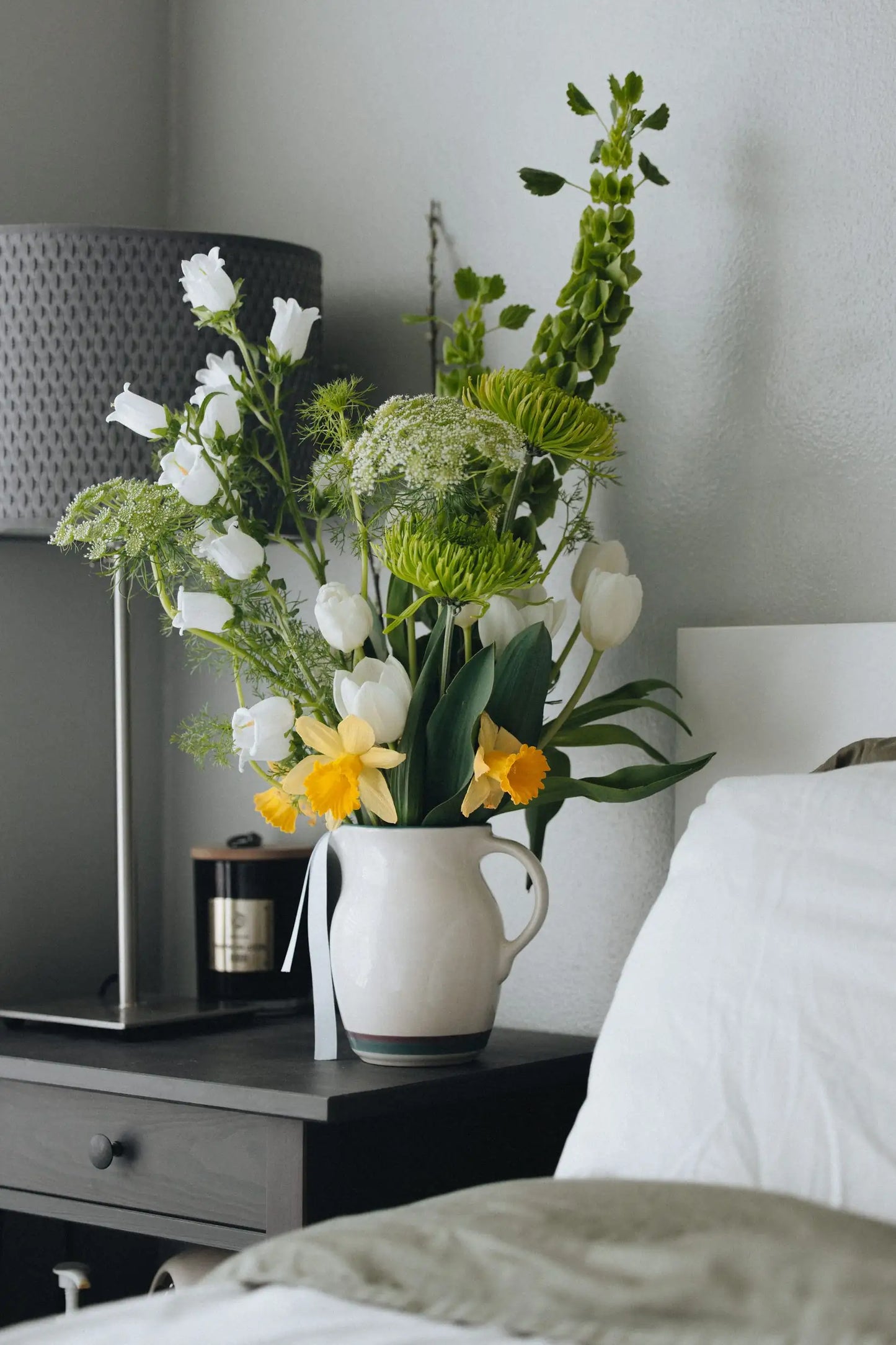 Bespoke medium flower bouquet with spring blooms on bedside table Portland flower delivery Kvetka Flower