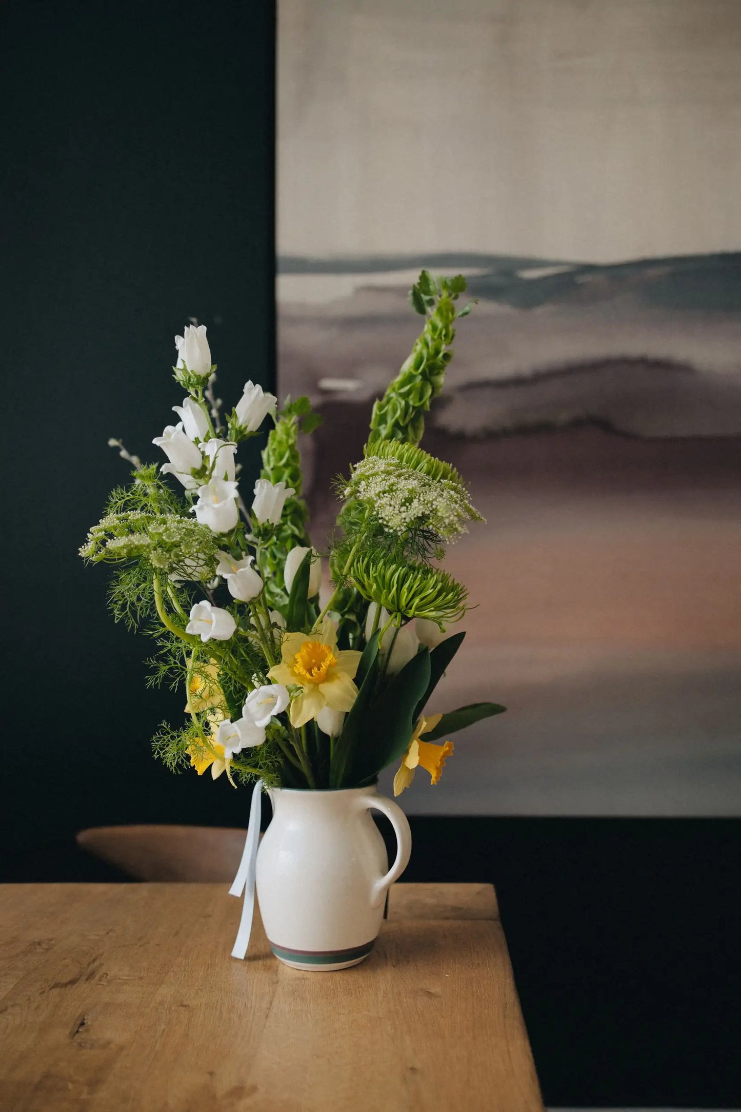 Custom flower arrangement medium white campanula bells of Ireland and seasonal greenery by Kvetka Flower Portland