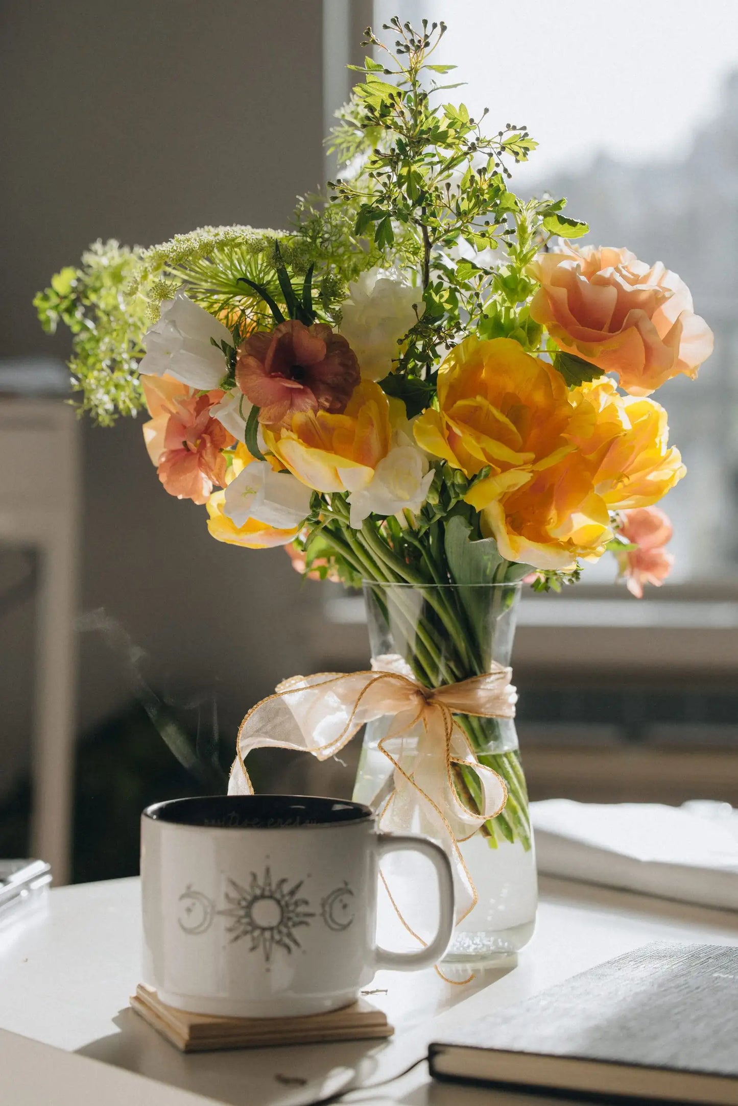 Custom flower bouquet small in glass vase morning light lifestyle Portland florist Kvetka Flower