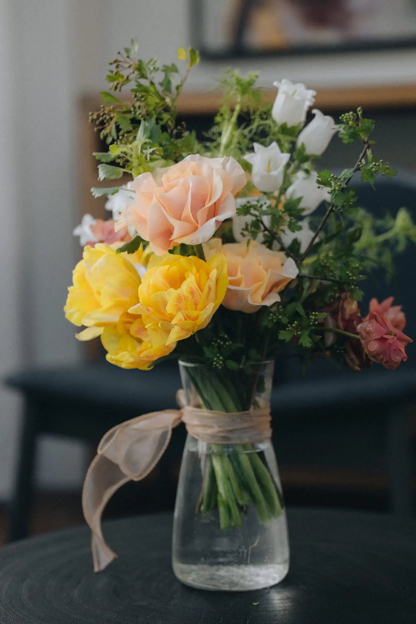 Custom flower bouquet small with peach roses and yellow tulips in glass vase by Kvetka Flower Portland Oregon