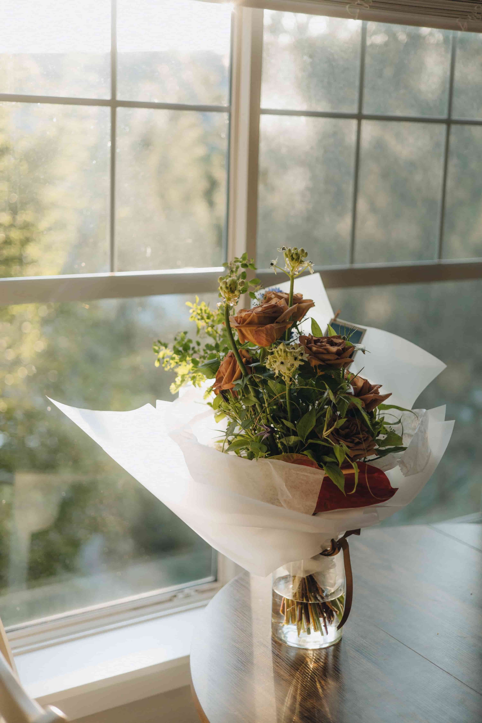 Amber roses with greenery and blue cornflowers — Evening Letter bouquet by Kvetka Flower in Portland, OR