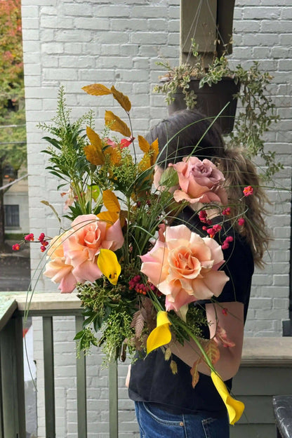 Hand-designed medium seasonal bouquet peach roses yellow calla lilies autumn foliage Portland florist Kvetka Flower same-day delivery