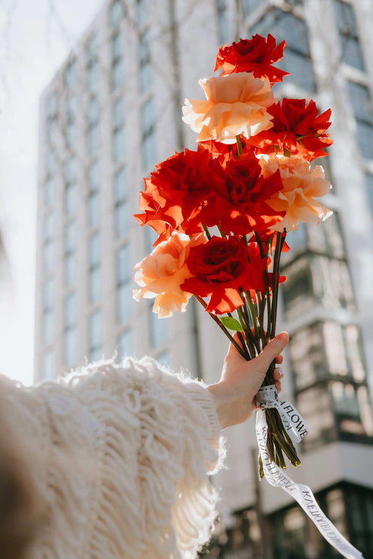 Bright red and peach roses bouquet in downtown Portland