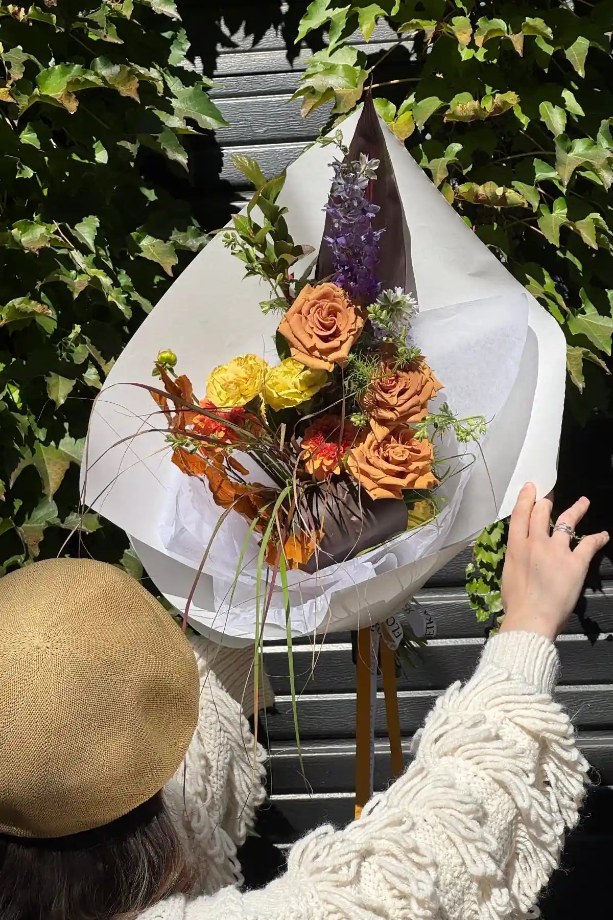 Handcrafted autumn bouquet small size with caramel roses, zinnias and seasonal blooms by Kvetka Flower florist