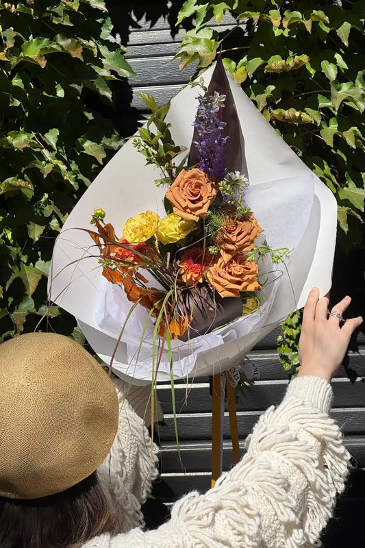 Handcrafted autumn bouquet small size with caramel roses, zinnias and seasonal blooms by Kvetka Flower florist