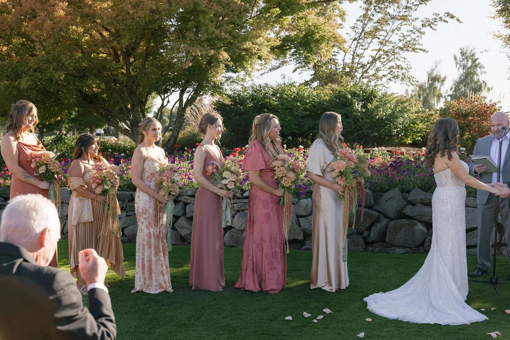 Wedding ceremony at Langdon Farms with bridesmaids holding fall bouquets, Kvetka Flower Portland florist