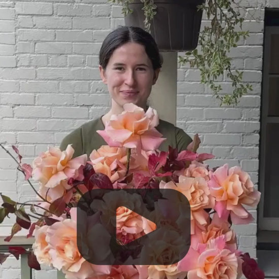 Fresh seasonal bouquet with peach roses and burgundy foliage rotating view hand-designed by Kvetka Flower Portland florist same-day delivery