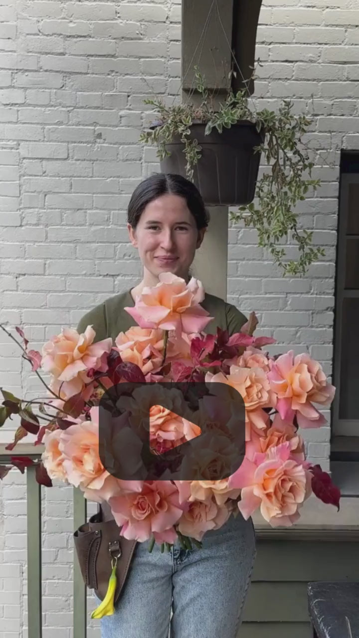 Fresh seasonal bouquet with peach roses and burgundy foliage rotating view hand-designed by Kvetka Flower Portland florist same-day delivery