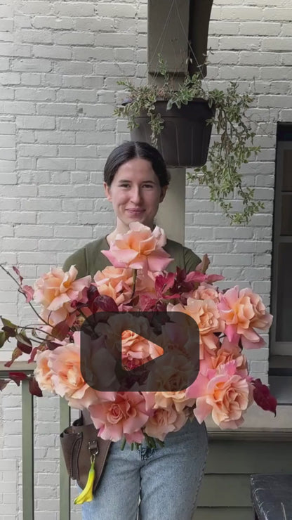 Fresh seasonal bouquet with peach roses and burgundy foliage rotating view hand-designed by Kvetka Flower Portland florist same-day delivery