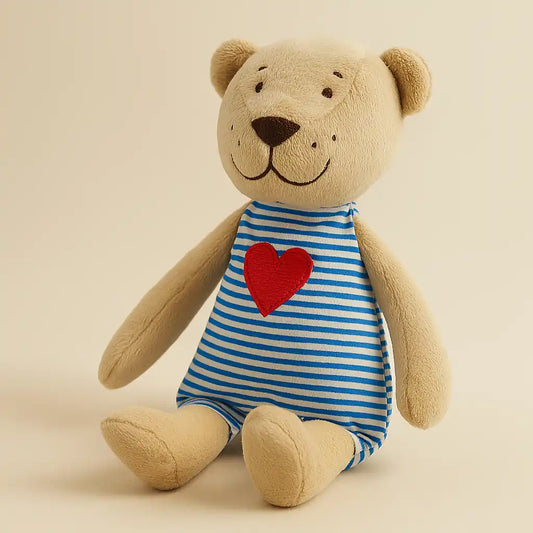 Beige plush teddy bear in blue striped outfit with red heart – Buddy Bear by Kvetka Flower, Portland OR
